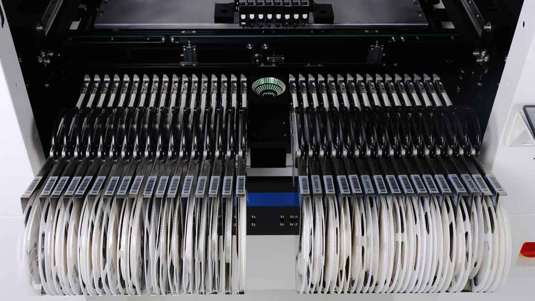 Pick and place production machine